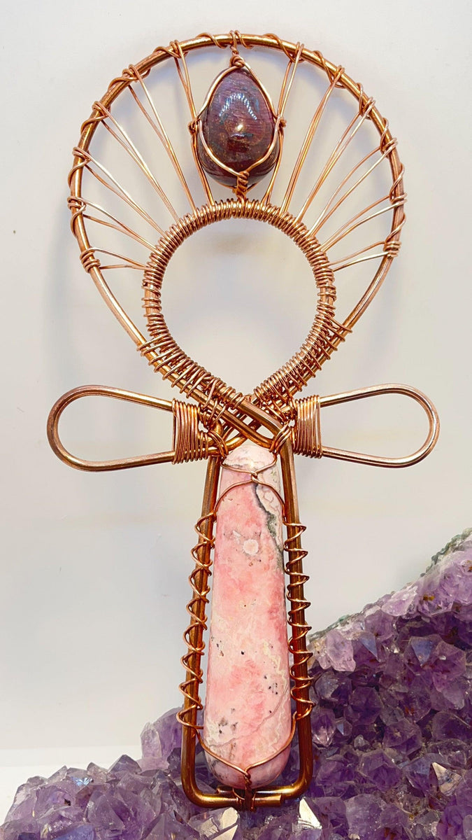 Rhodochrosite and Ruby Egg Handheld Ankh Infinite Treasures, LLC